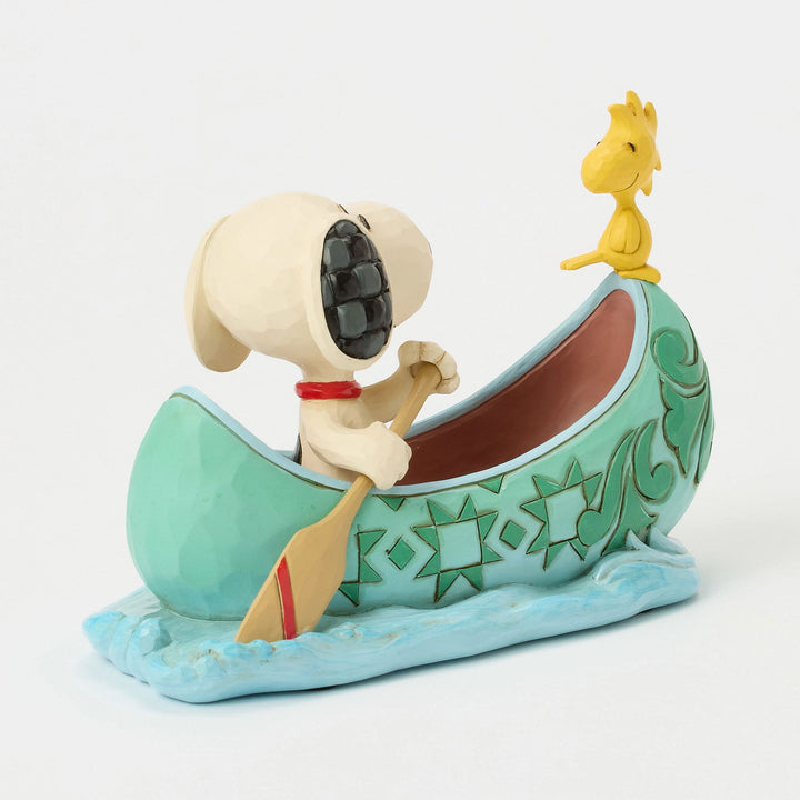 Snoopy and Woodstock in a Canoe