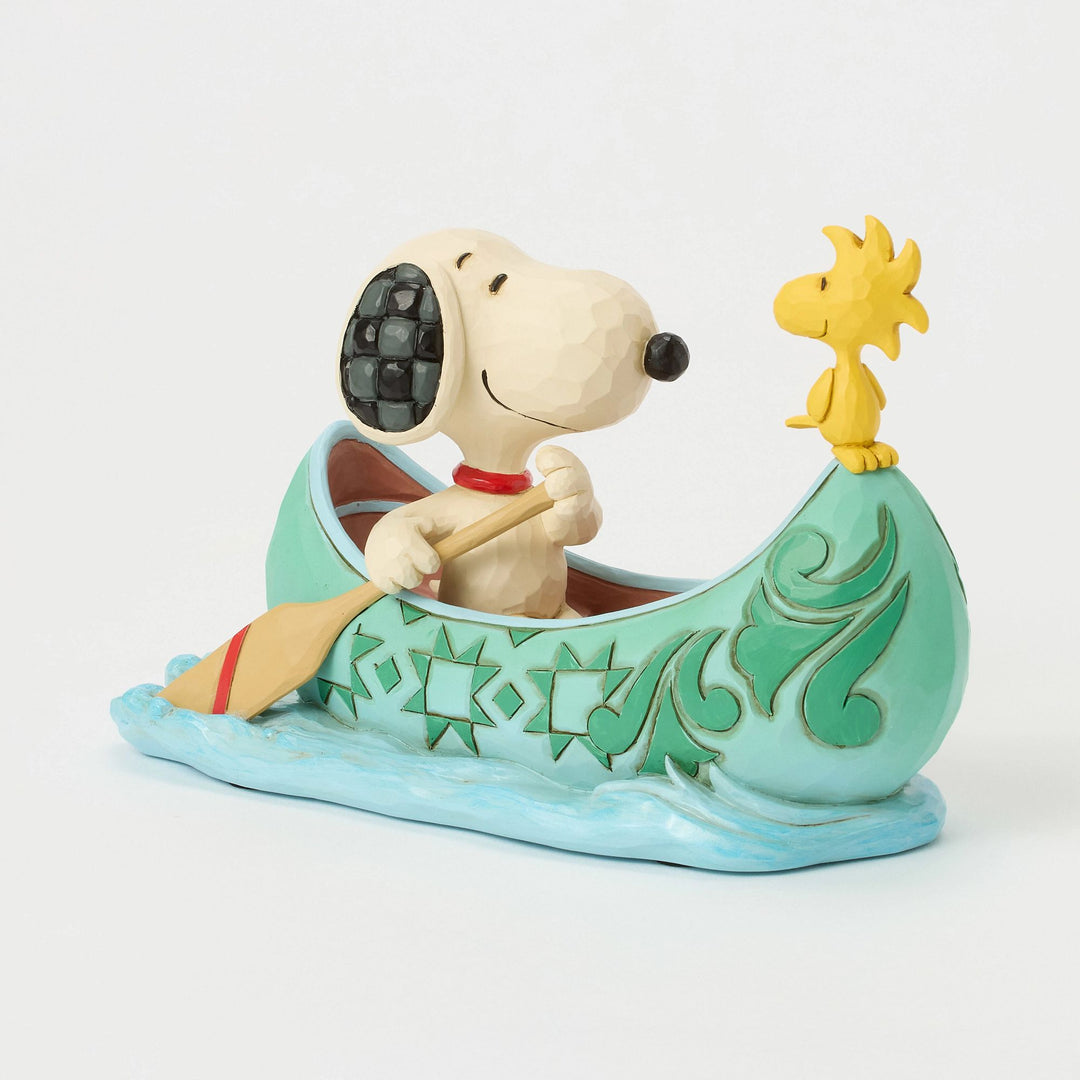 Snoopy and Woodstock in a Canoe