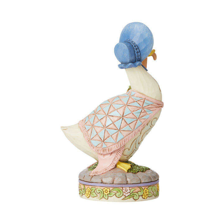 ..wearing a shawl and a poke bonnet (Jemima Puddle-Duck)