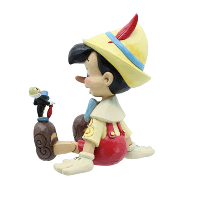 Wishful and Wise (Pinocchio and Jiminy Sitting) Disney Traditions by Jim Shore - Jim Shore Designs UK