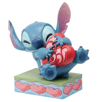 Heart Struck (Stitch Hugging a Heart Figurine) - Disney Traditions by Jim Shore