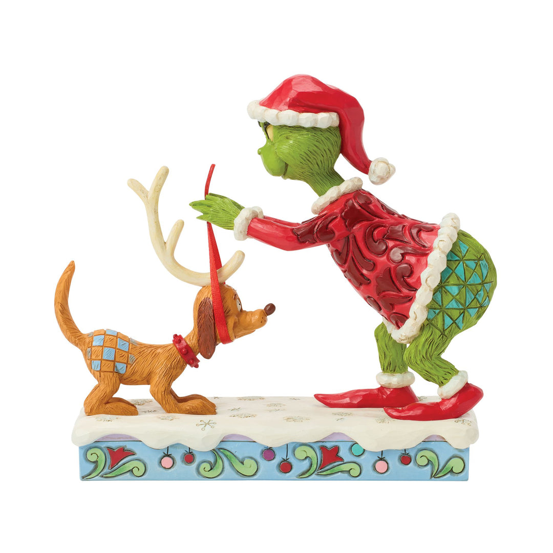 The Grinch Tying Antlers on Max Figurine