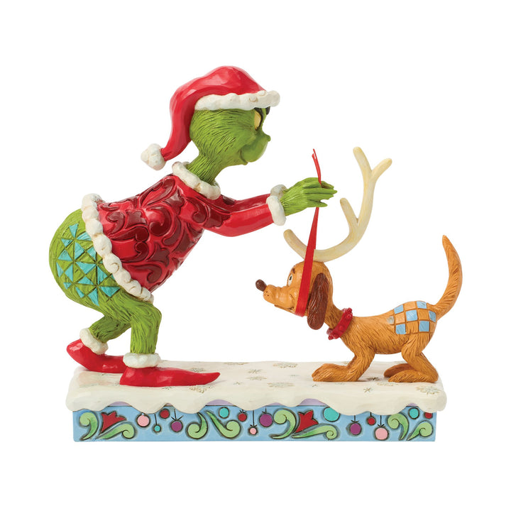 The Grinch Tying Antlers on Max Figurine