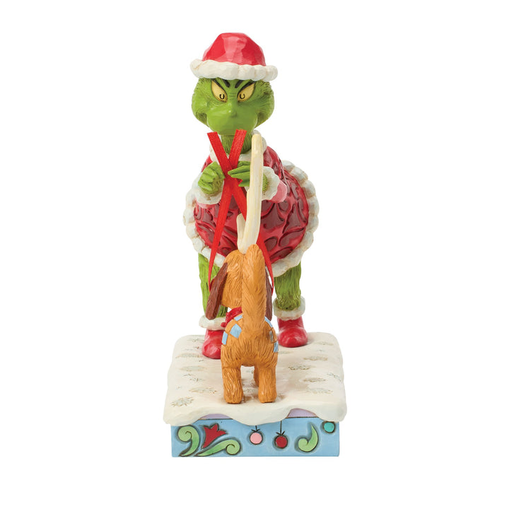 The Grinch Tying Antlers on Max Figurine