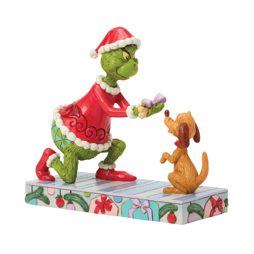 The Grinch Giving Max a Bone Figurine
