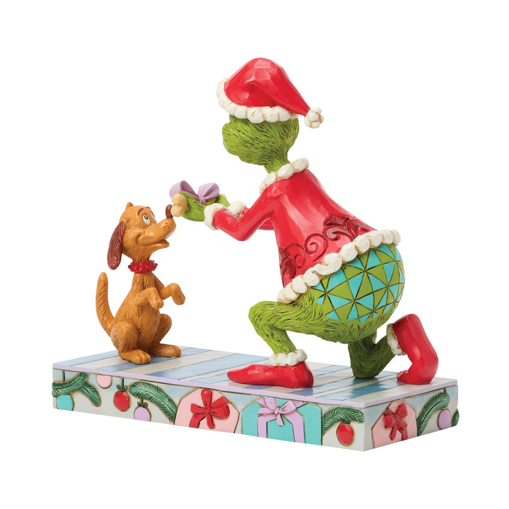 The Grinch Giving Max a Bone Figurine