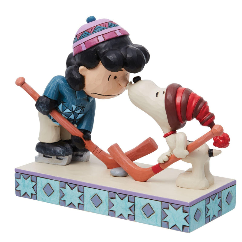 A Surprise Smooch (Snoopy and Lucy Playing Hockey Figurine) - Peanuts by Jim Shore - Jim Shore Designs UK