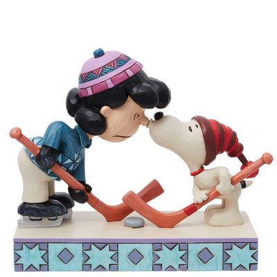 A Surprise Smooch (Snoopy and Lucy Playing Hockey Figurine) - Peanuts by Jim Shore - Jim Shore Designs UK